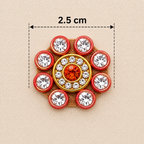 Decorative brooch with gemstones and measurements on a beige background