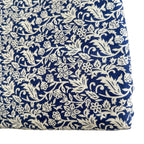Navy blue fabric with white floral pattern