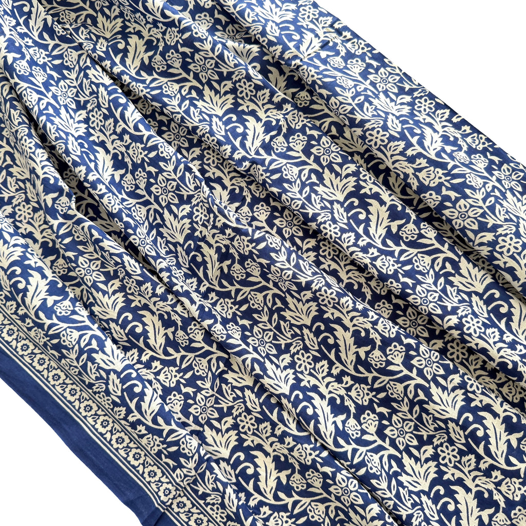 Blue fabric with white floral pattern