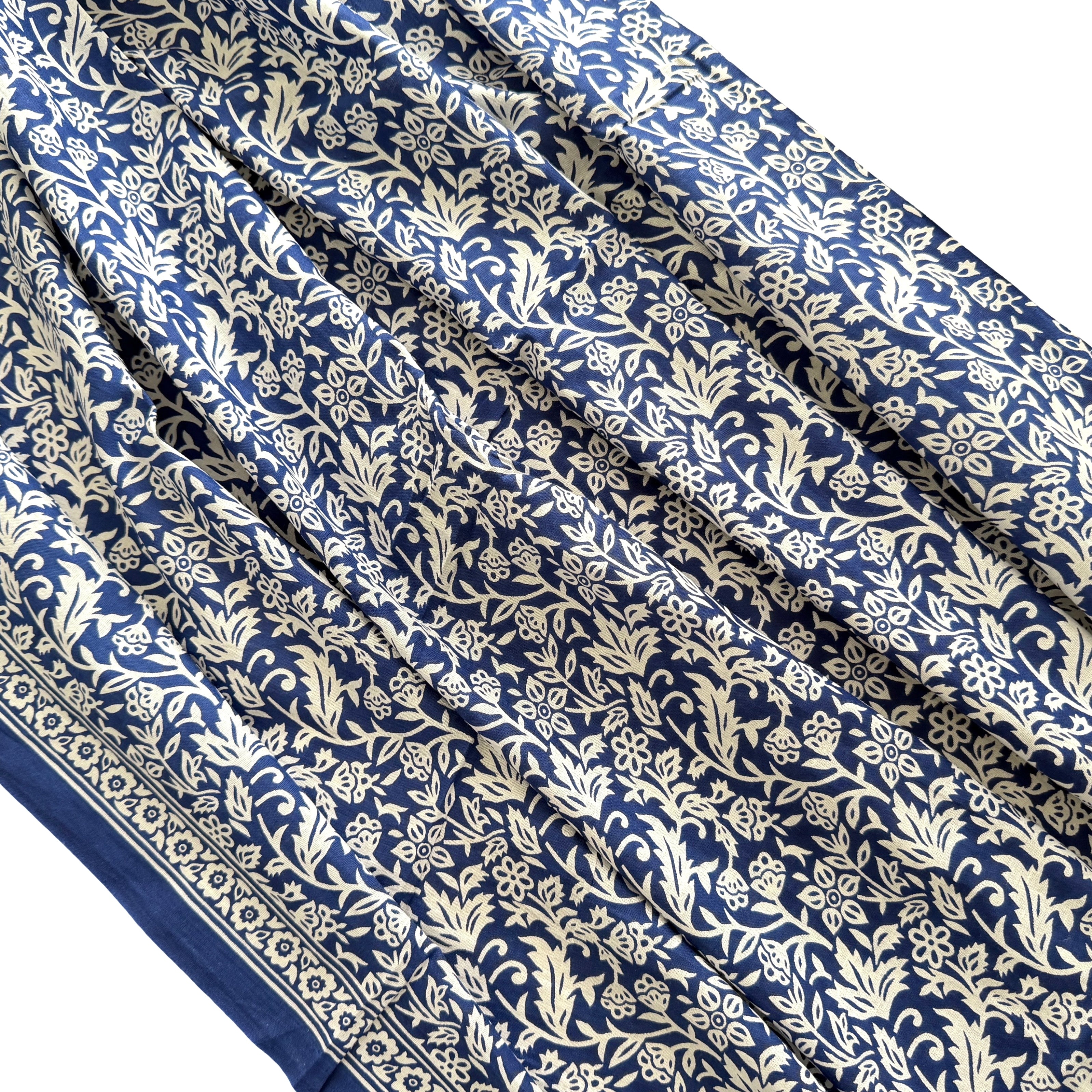Blue fabric with white floral pattern