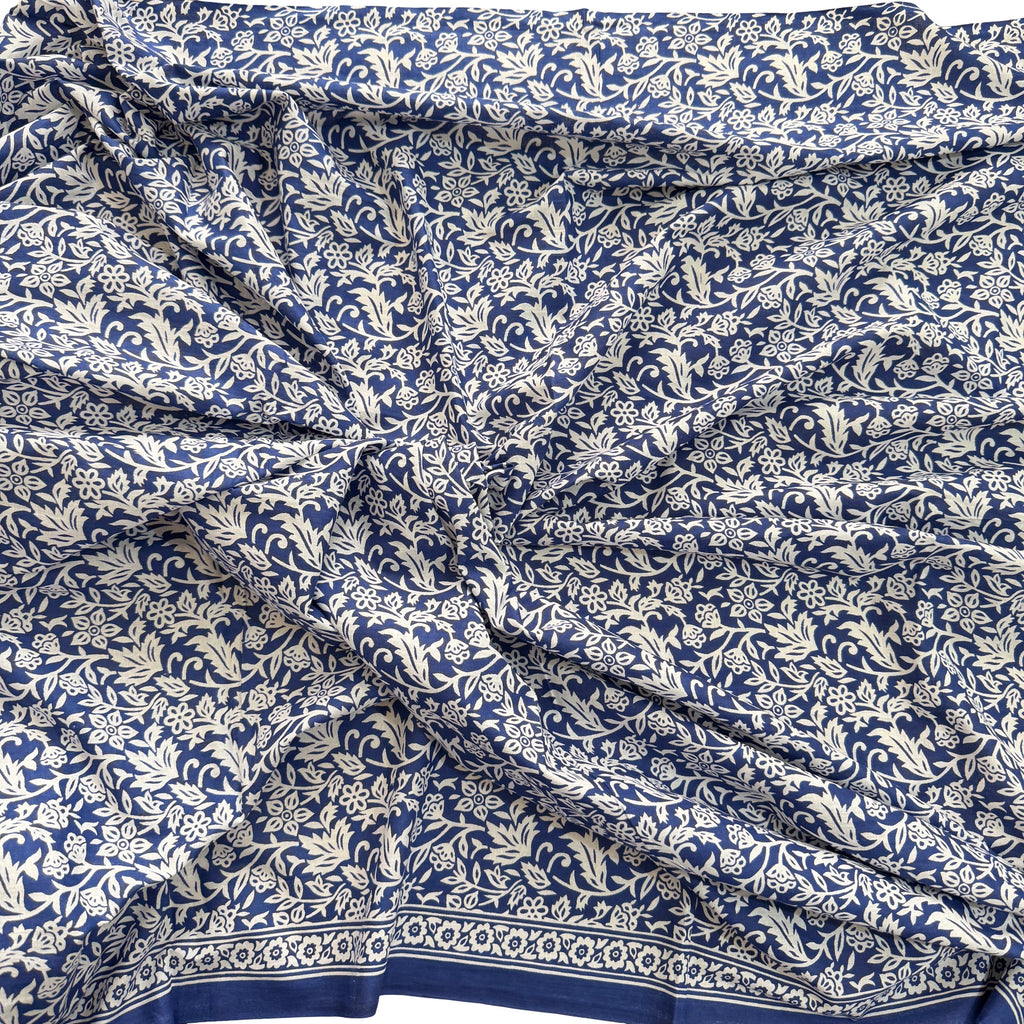 Blue fabric with white floral pattern