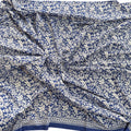 Blue fabric with white floral pattern
