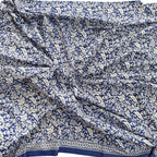 Blue fabric with white floral pattern