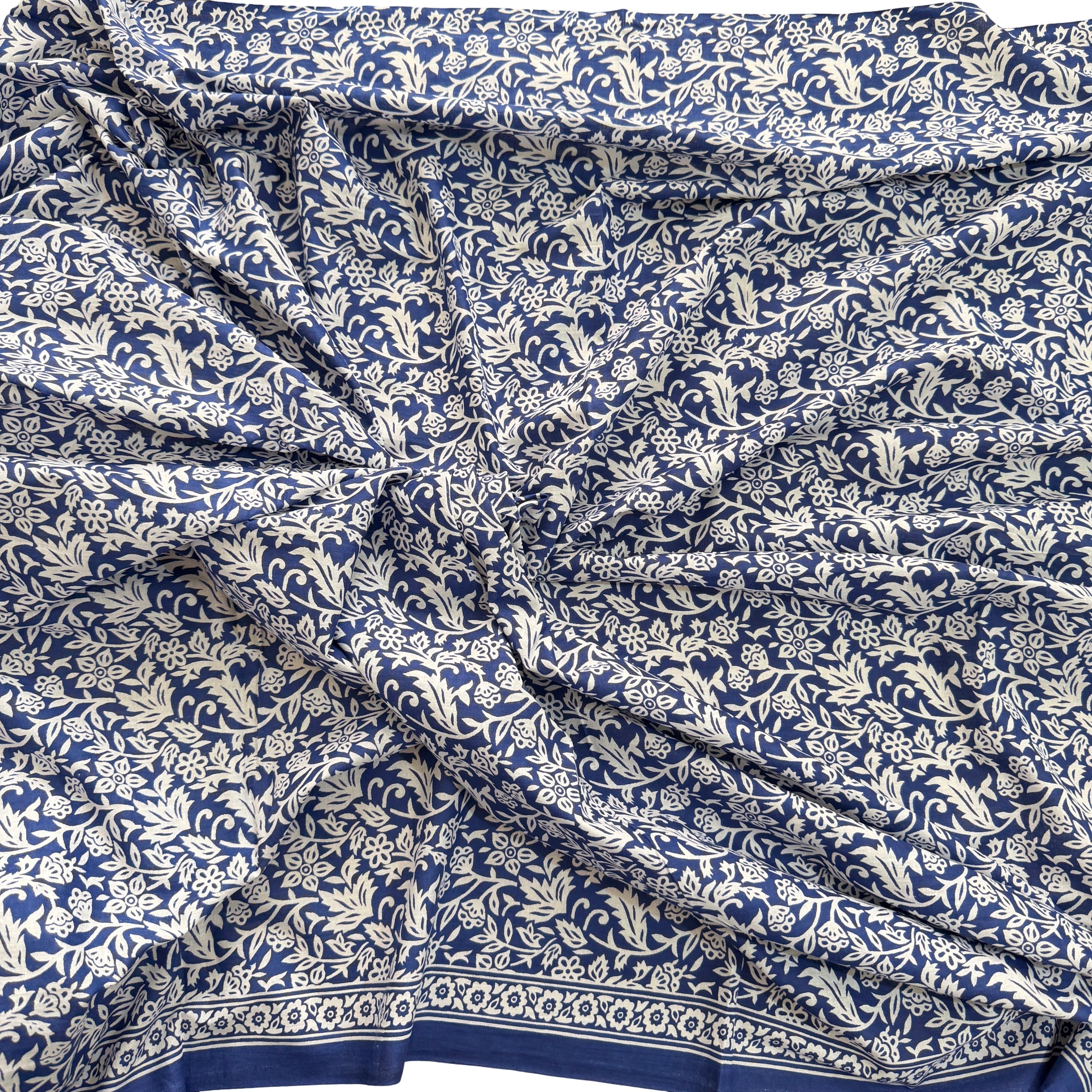Blue fabric with white floral pattern