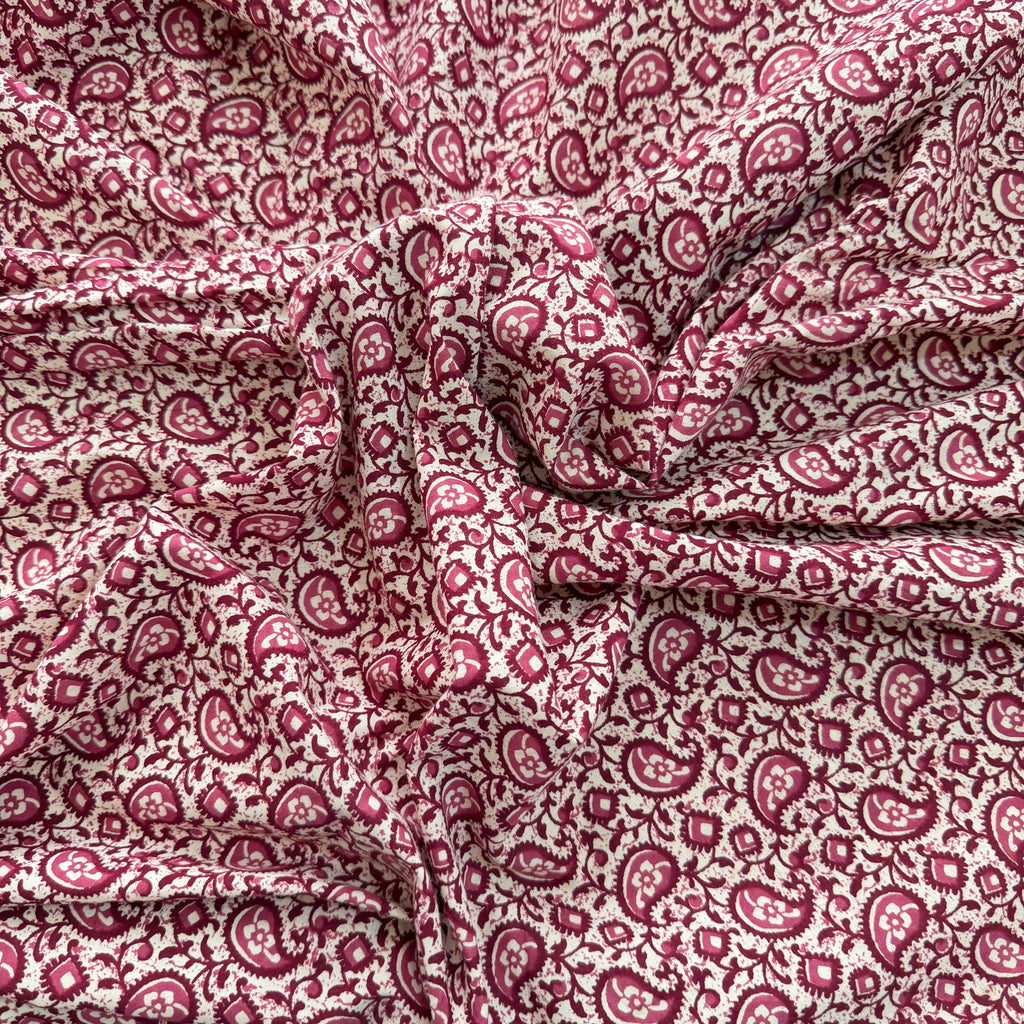 Close-up of red paisley patterned fabric