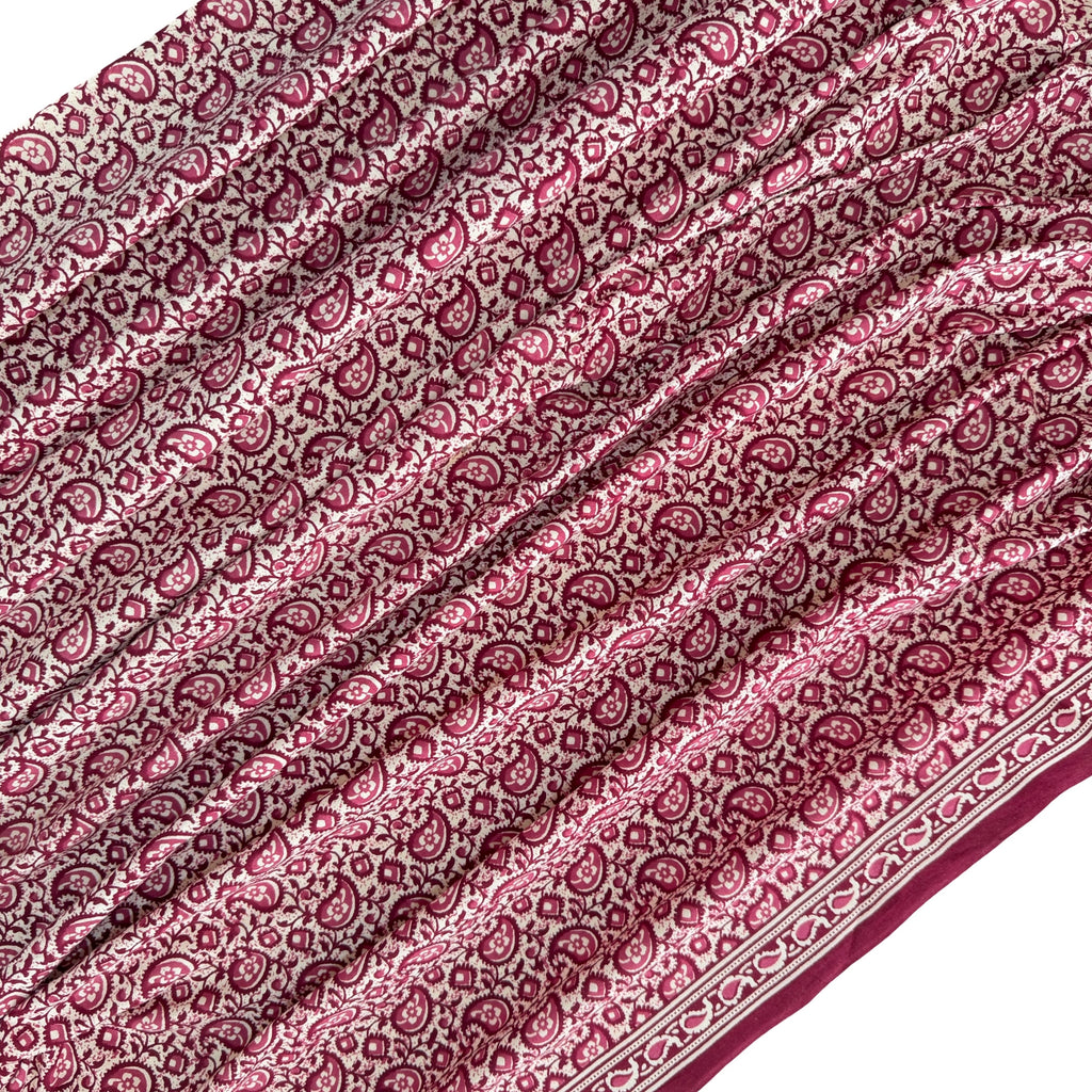 Close-up of a red and white paisley patterned fabric