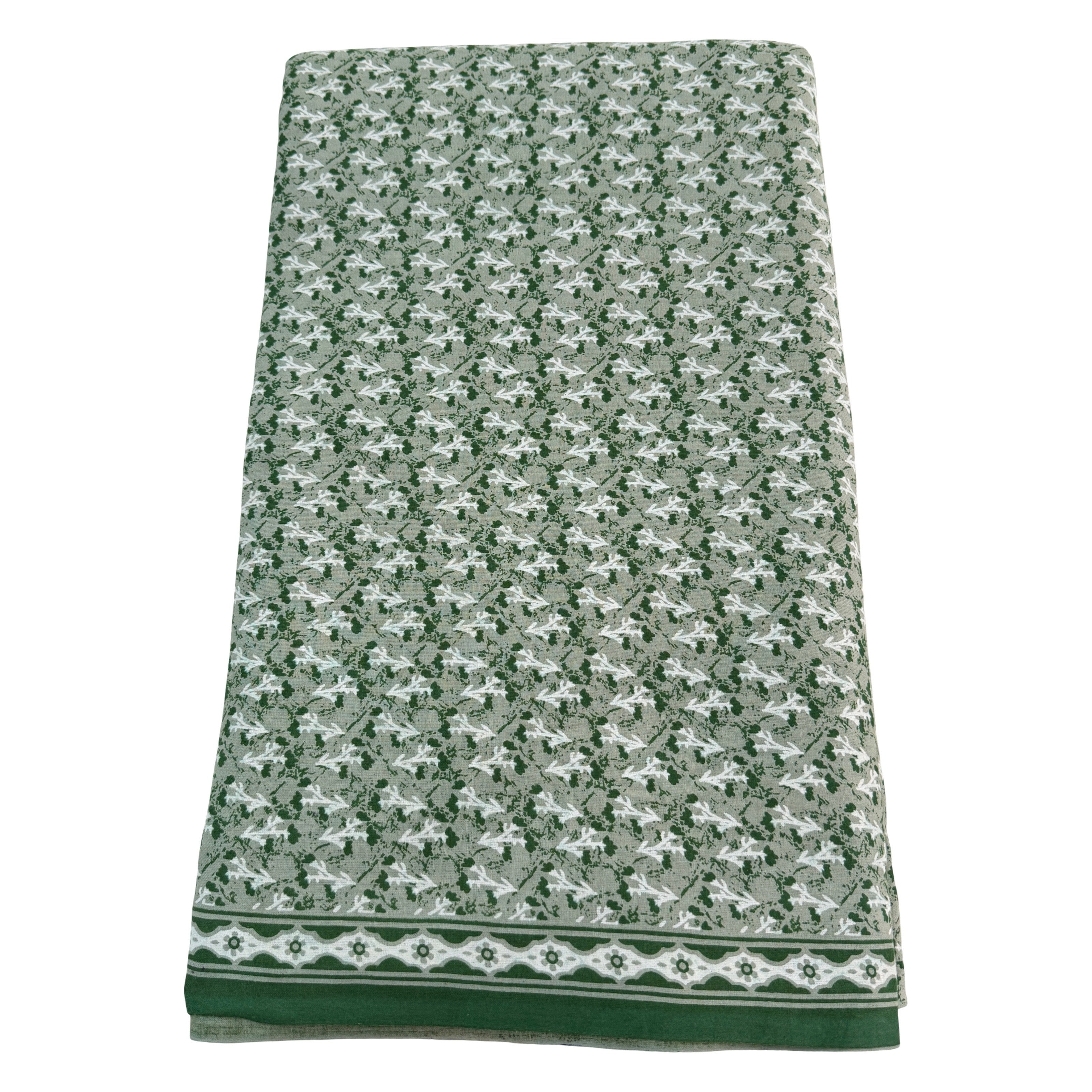 Green and white patterned towel on a white background
