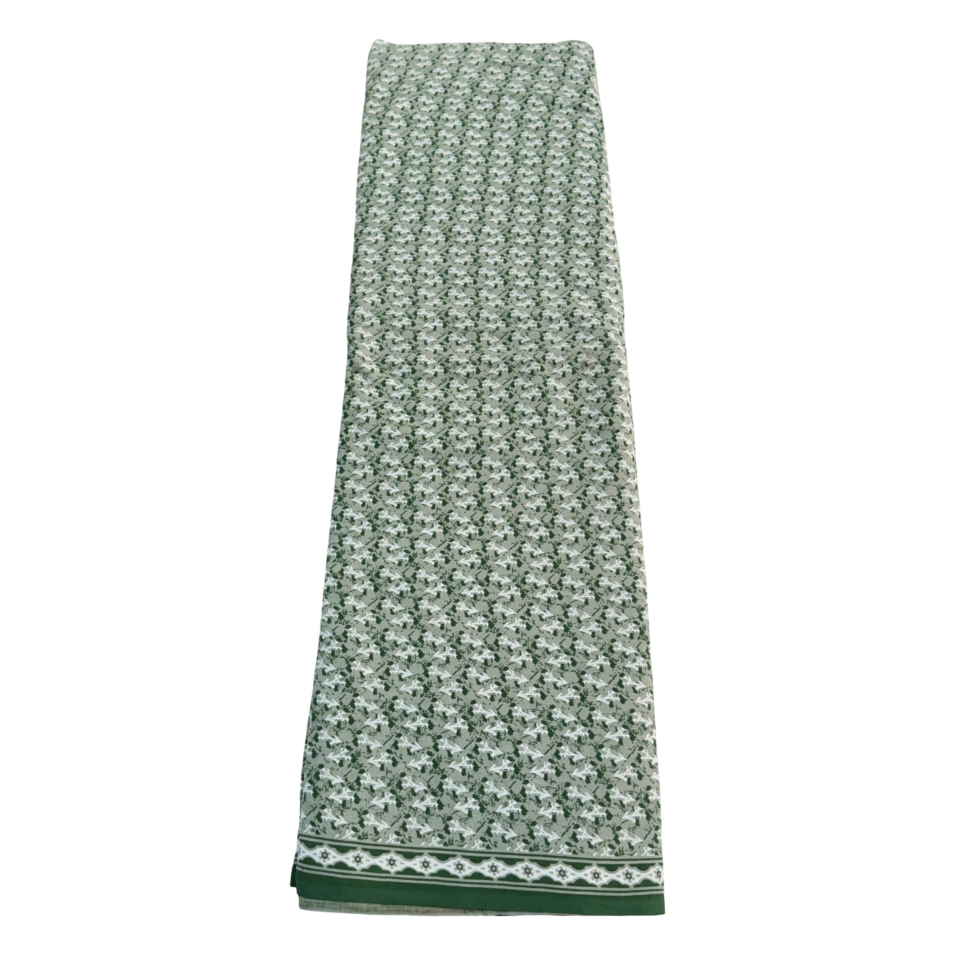 Green patterned towel on a white background
