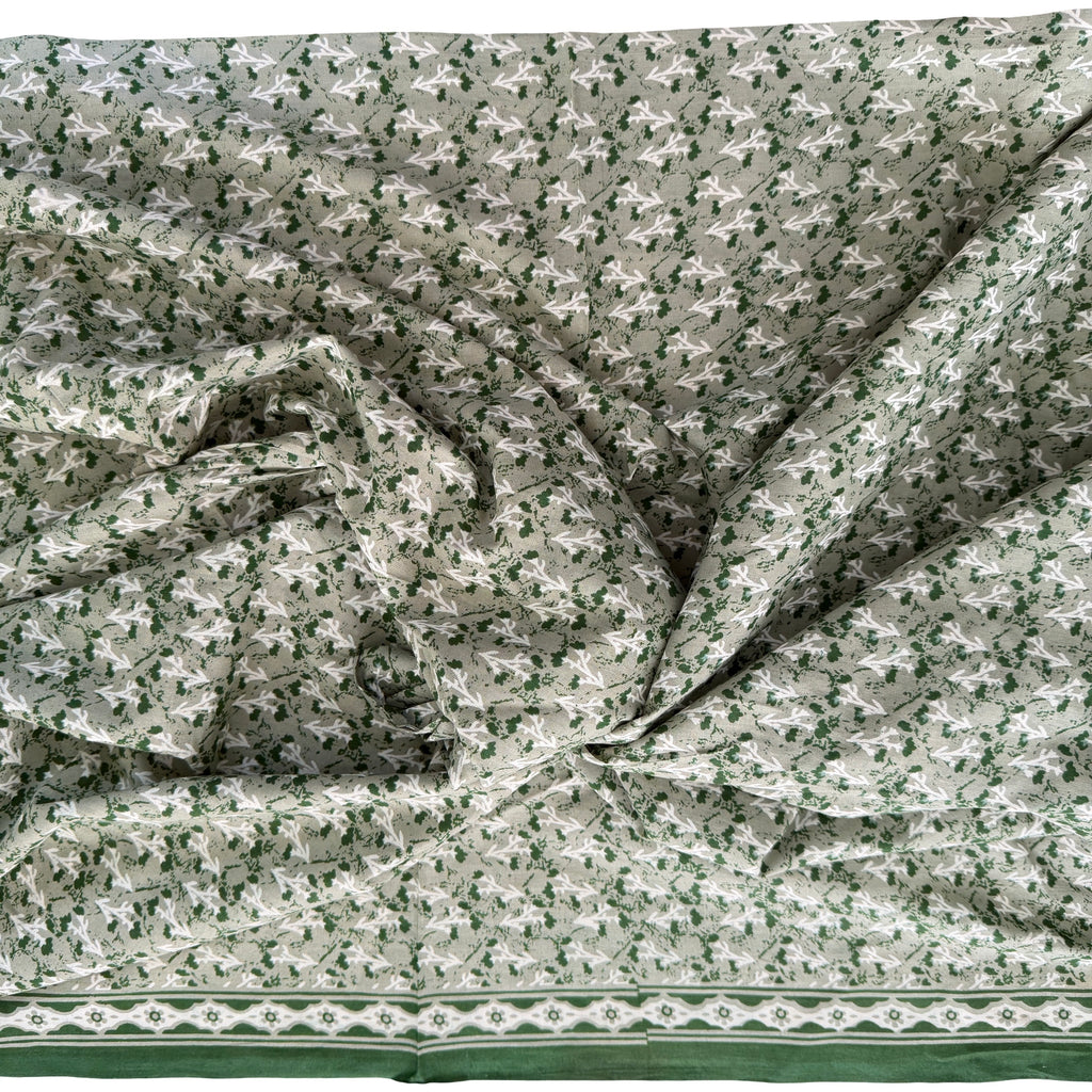 Floral patterned fabric with a green border