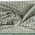 Floral patterned fabric with a green border