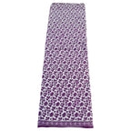 Long skirt with purple floral pattern on a white background