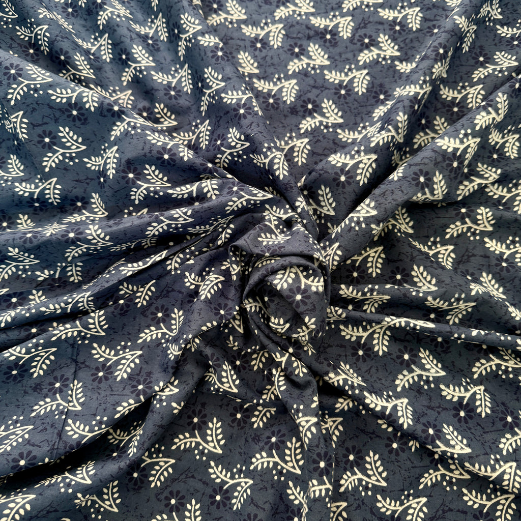 Dark fabric with light leaf pattern