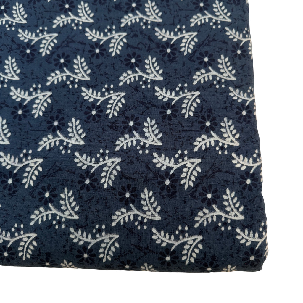 Navy blue fabric with white floral pattern