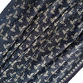 Navy blue fabric with white floral pattern