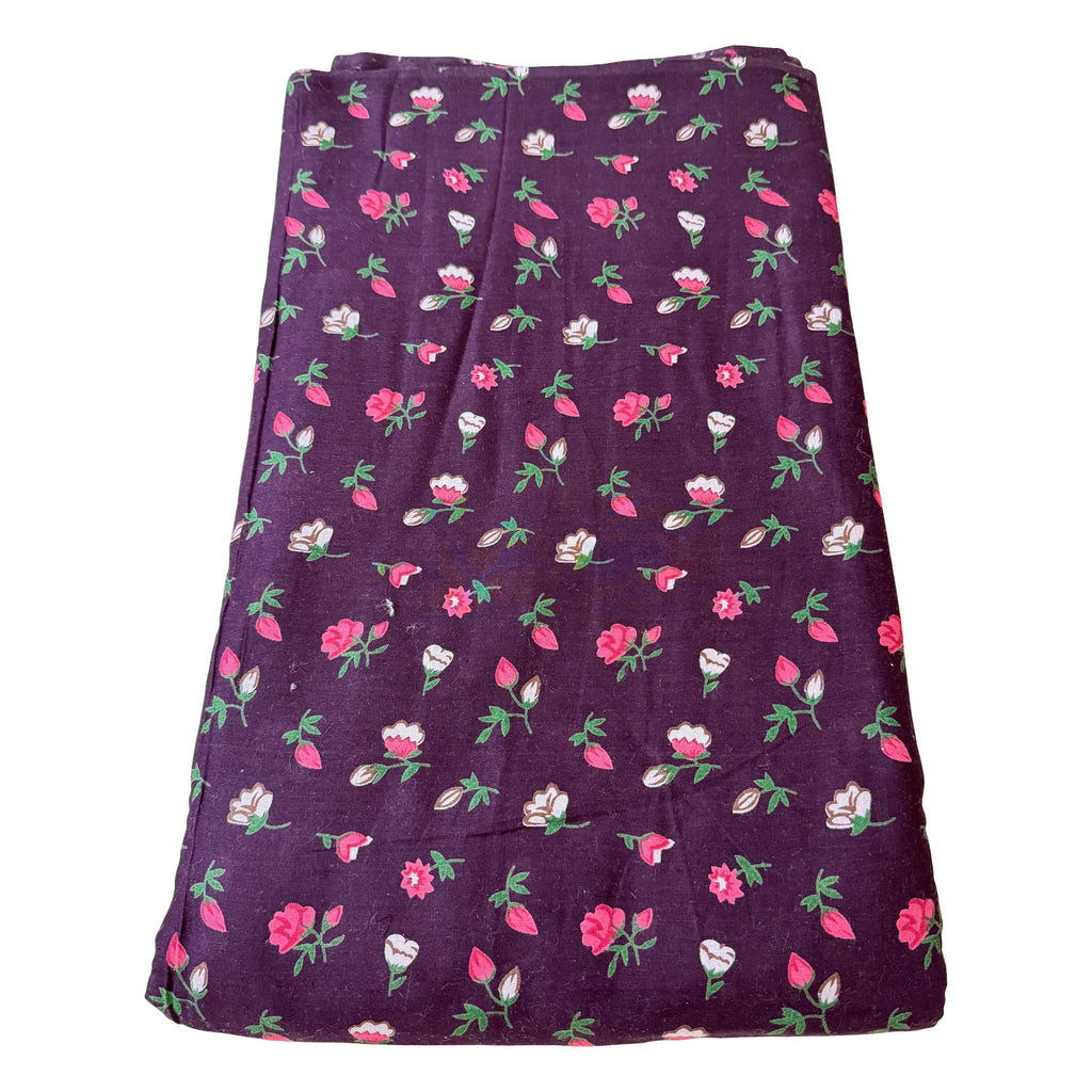 Floral patterned fabric on a purple background