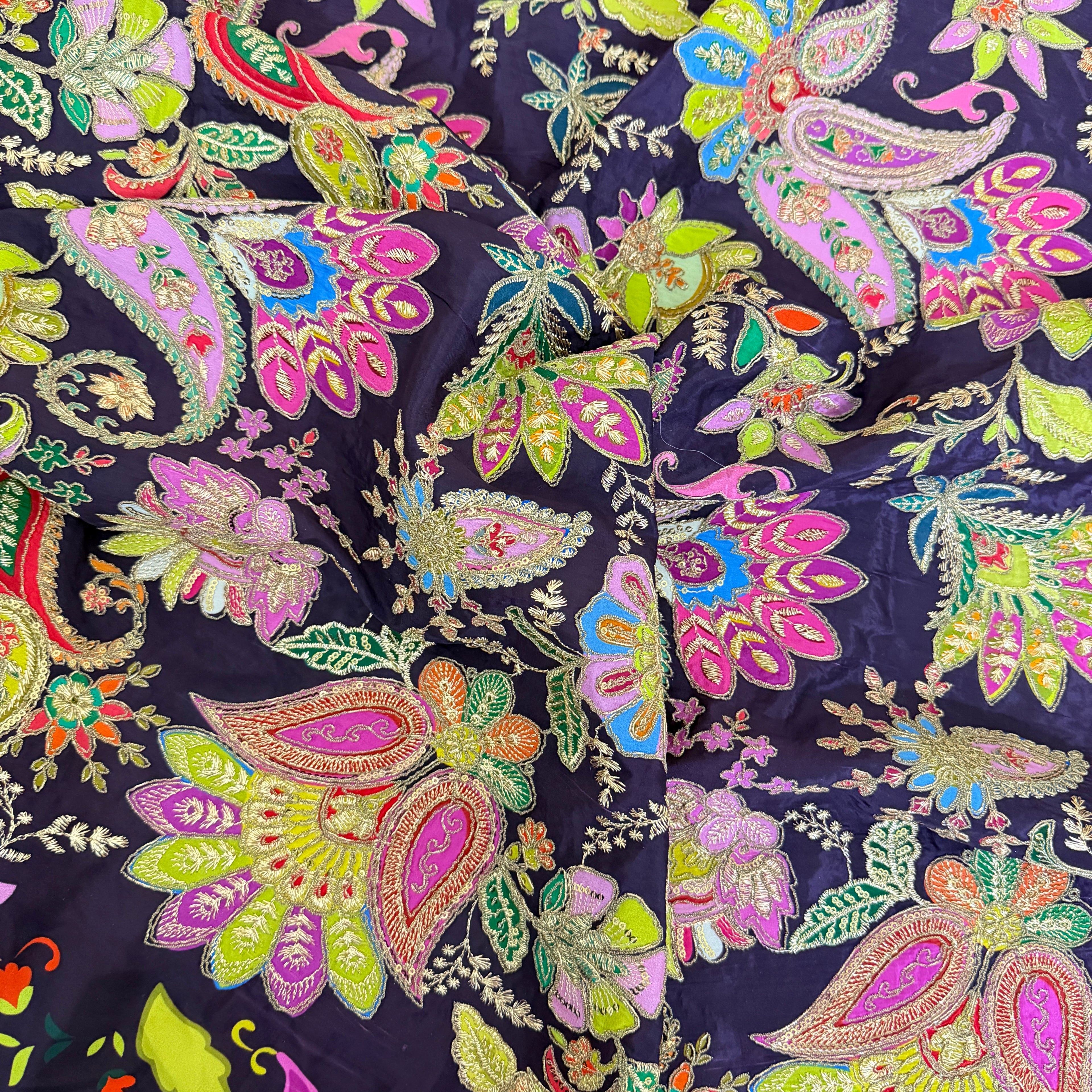 Colorful paisley pattern on a dark background