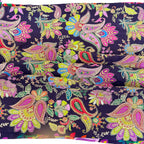 Colorful paisley pattern on a dark background