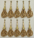 Gold tassels with beaded design on a white background