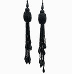 Pair of black beaded tassel earrings on a white background