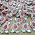 Collection of pink sequin patches with white pearl-look beads and leaf-shaped mirror accents