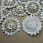 Collection of ivory pearl-look and mirror floral round patches