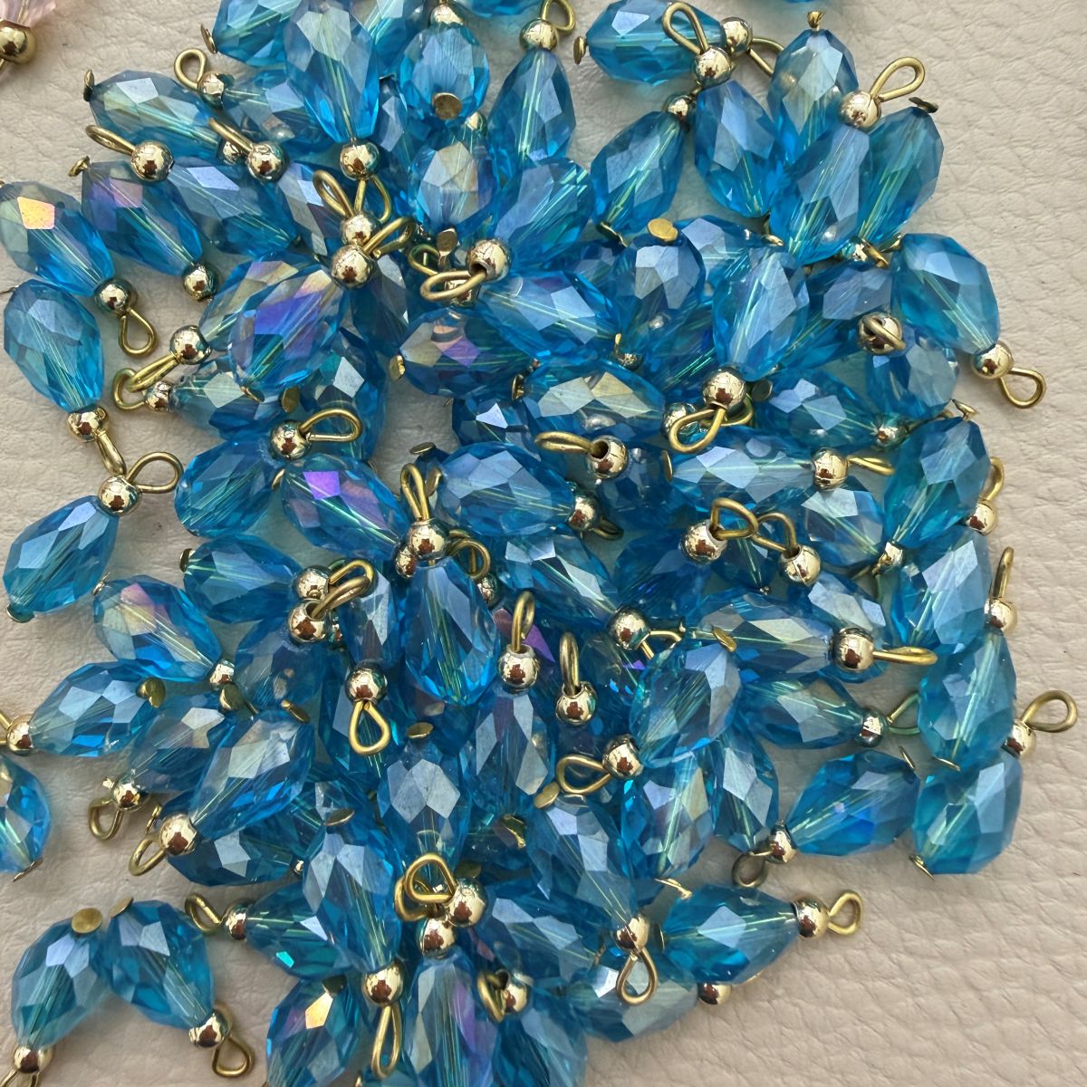 Faceted Teardrop Beads with Gold-Tone Attachment Loops – 50 Pieces