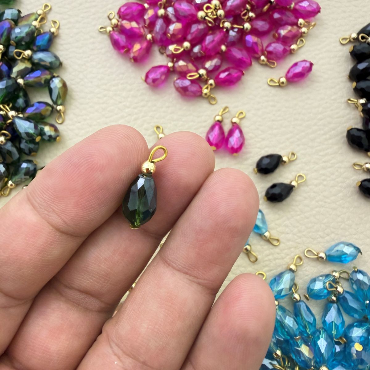 Faceted Teardrop Beads with Gold-Tone Attachment Loops – 50 Pieces