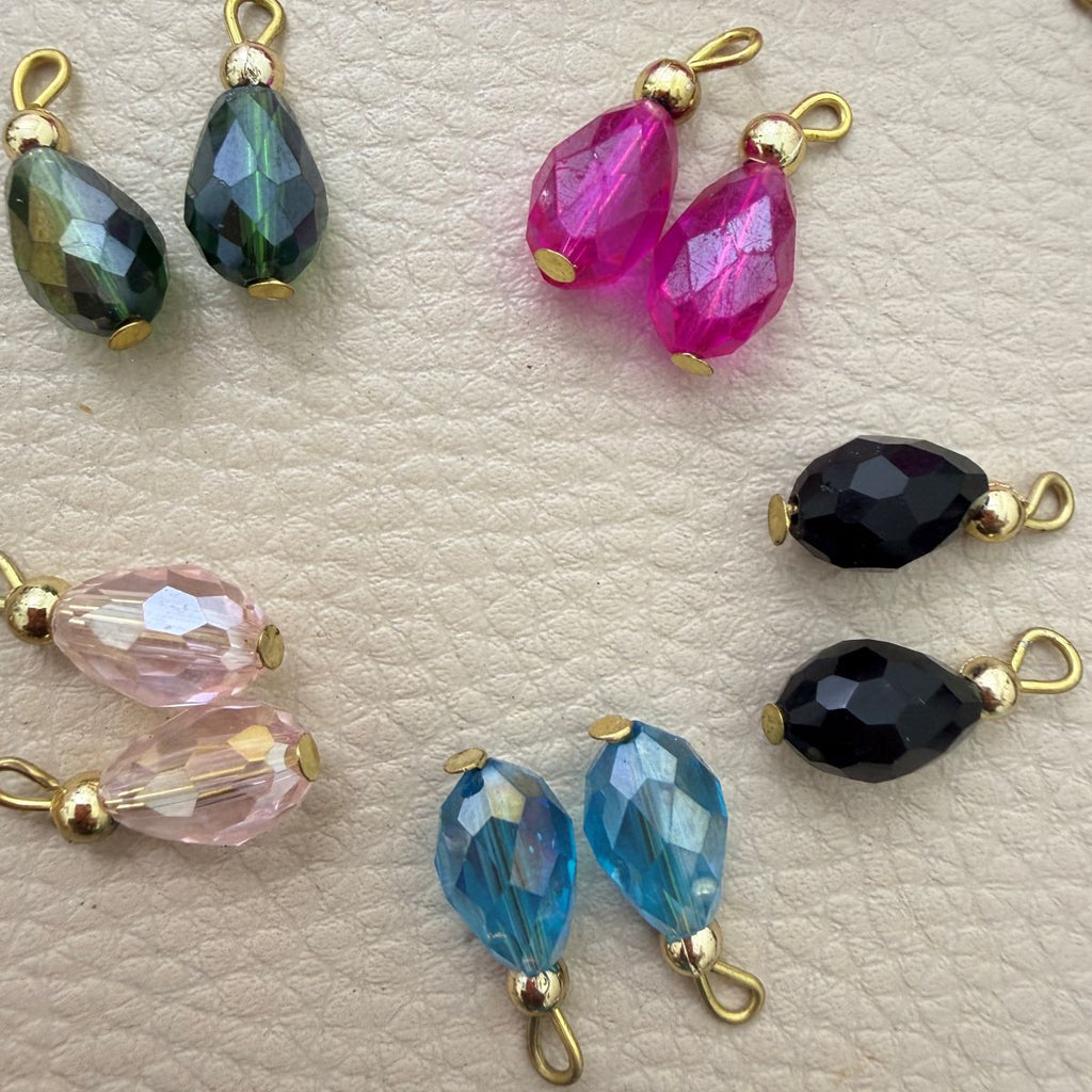 Faceted Teardrop Beads with Gold-Tone Attachment Loops – 50 Pieces