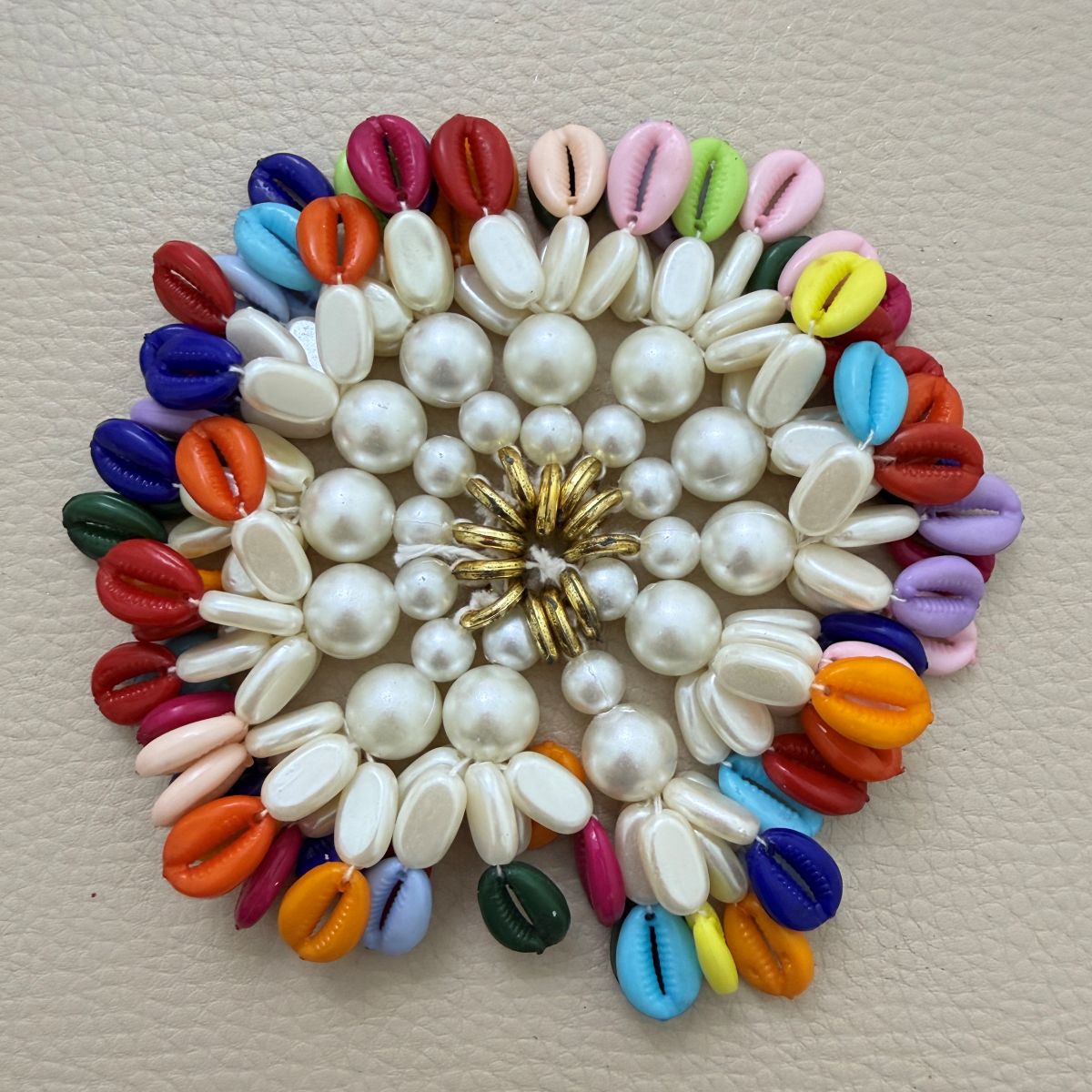 Close-up of multicolor kodi tassels with creamy white accents