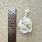 Group of white shell and pearl-look bead tassels with attachment loops