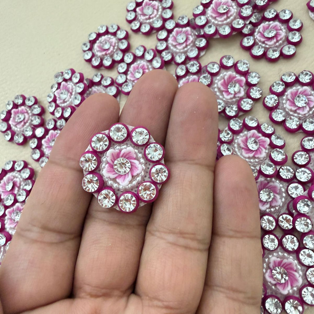 Pink flower rhinestone appliques with pearl-look borders and magenta edging