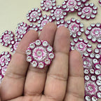 Pink flower rhinestone appliques with pearl-look borders and magenta edging