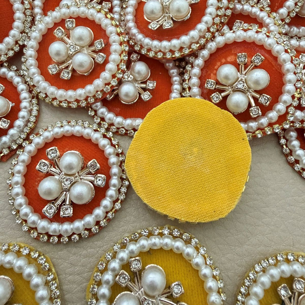 Plain yellow fabric reverse of a round decorative patch
