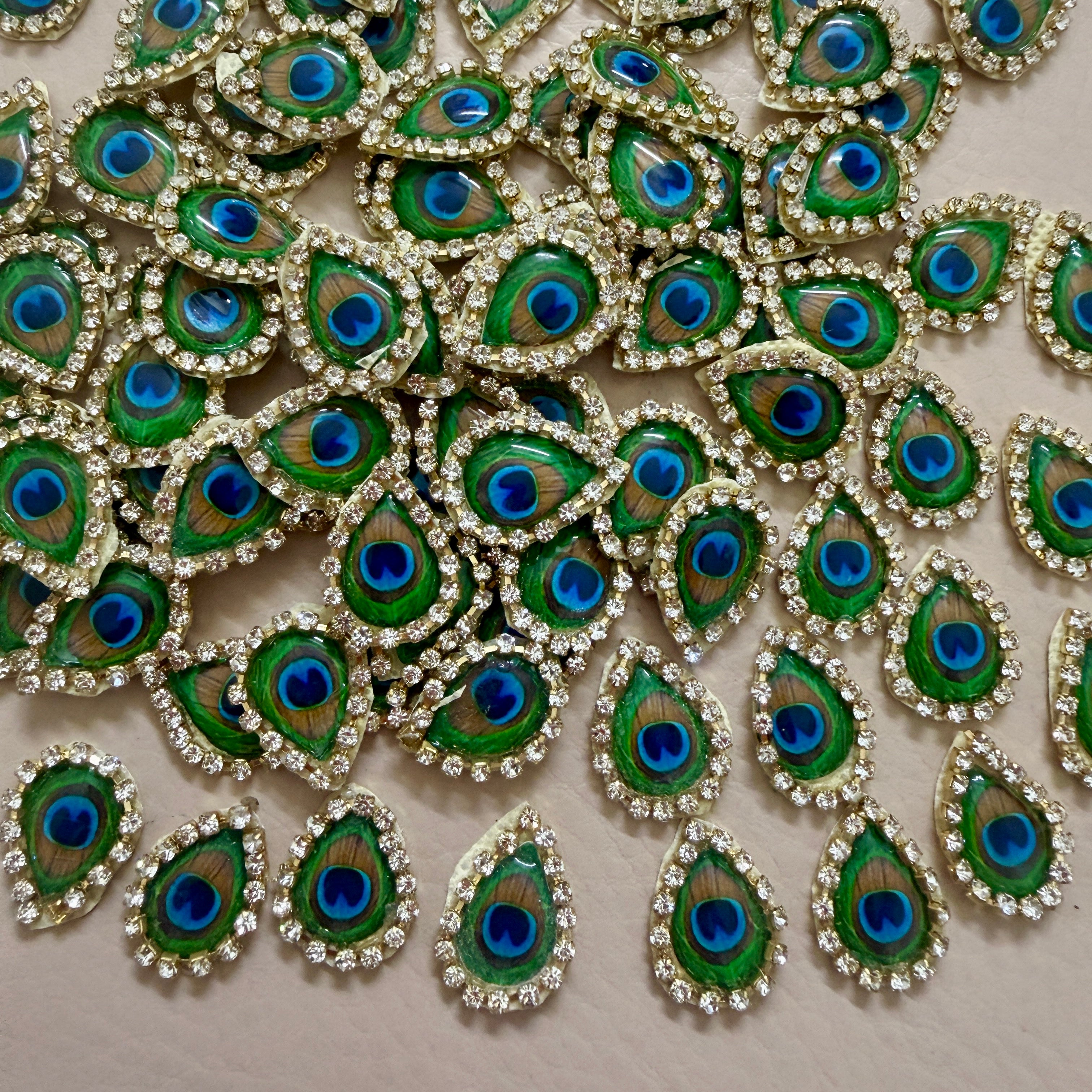 Decorative peacock feather patterns with blue centers on a beige background