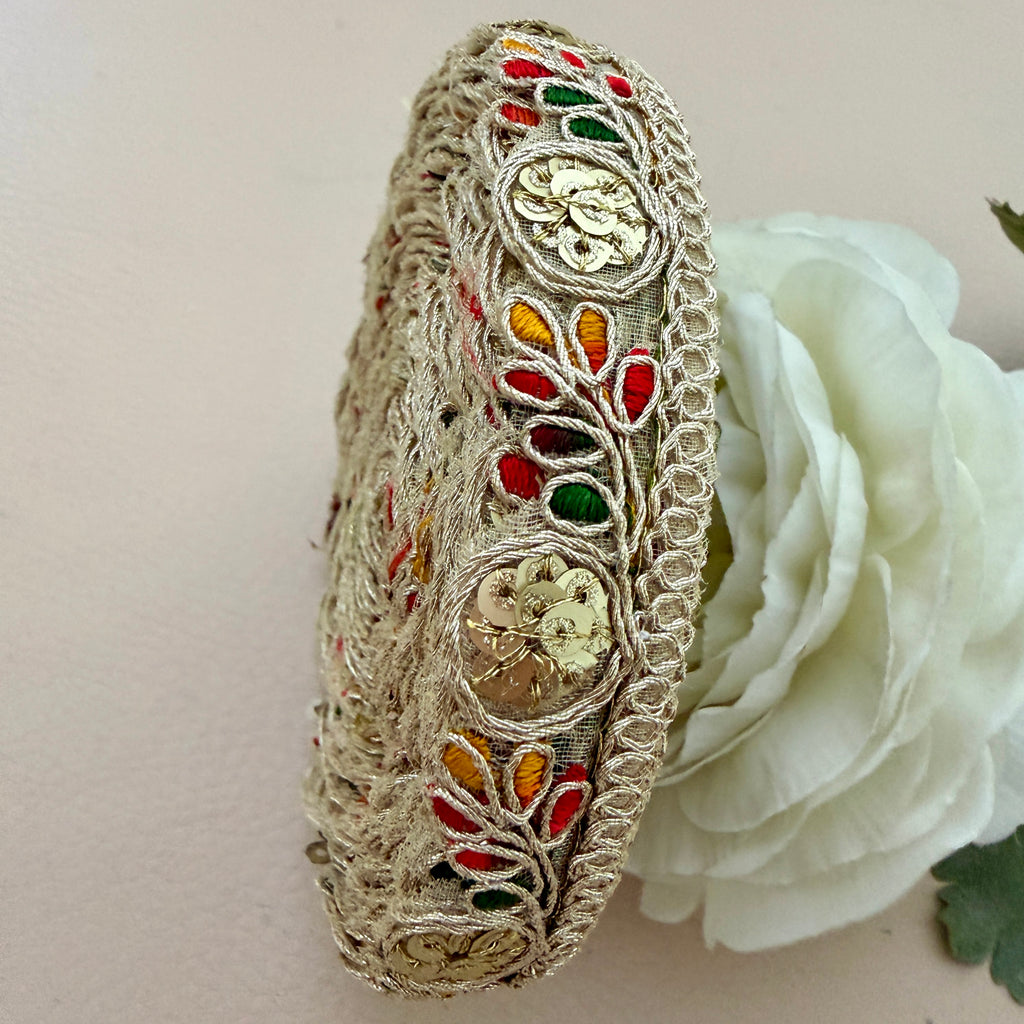 Decorative Lace with colorful embroidery on a white flower background