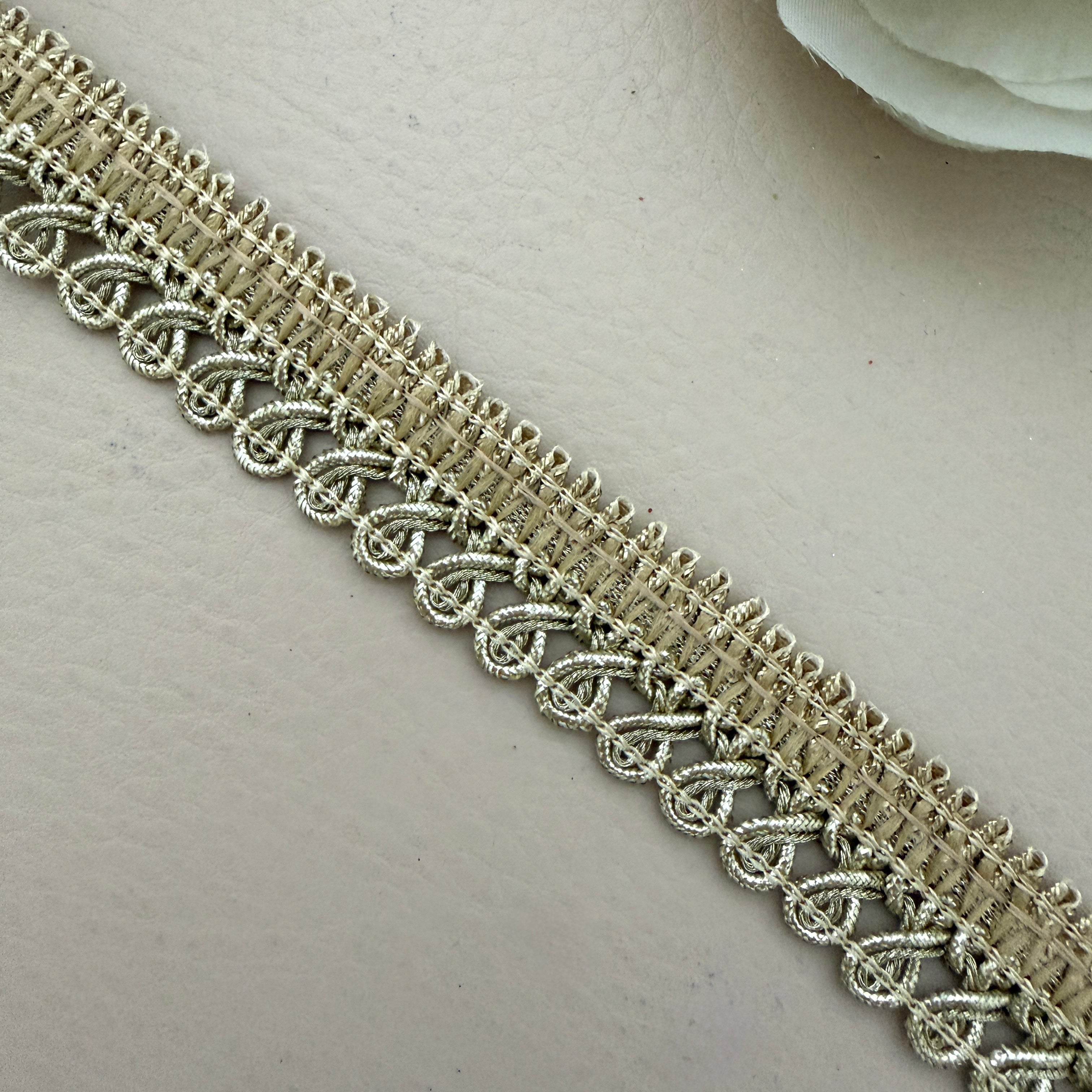 Decorative lace trim on a light background