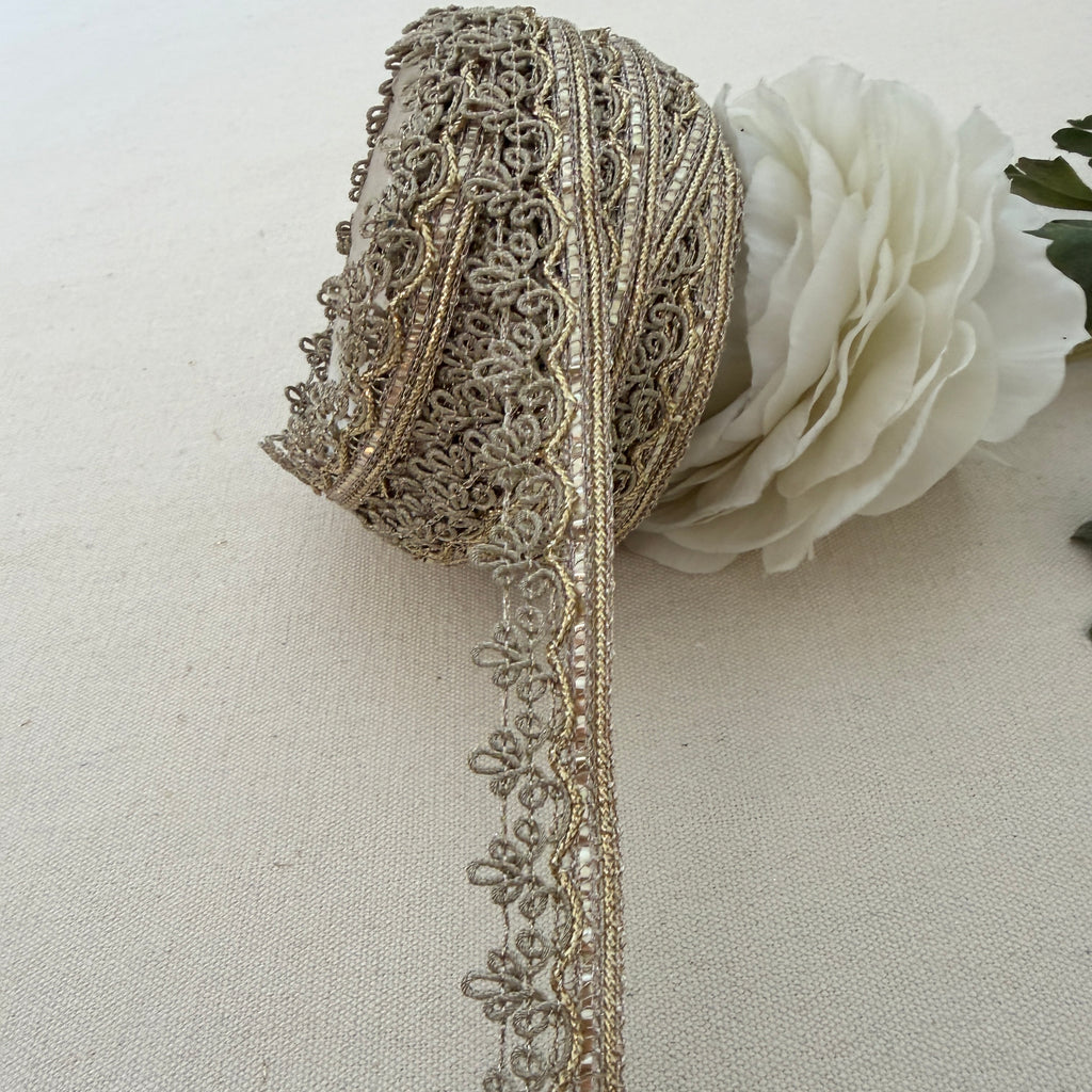 Decorative ribbon with intricate patterns on a white background