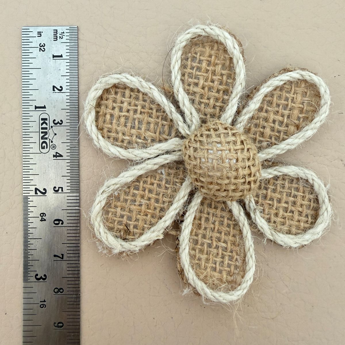 Front and back view of burlap daisy flower patch