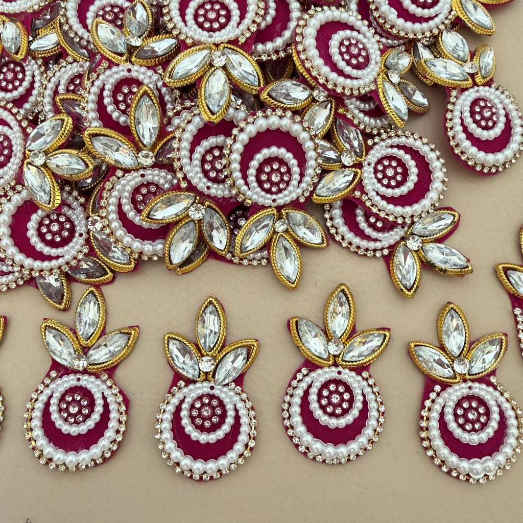 Magenta Kundan Pearl Crystal Applique Patch held in hand showing front detail