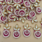 Magenta Kundan Pearl Crystal Applique Patch held in hand showing front detail