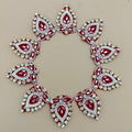Red crystal and pearl embellished patch – bulk view