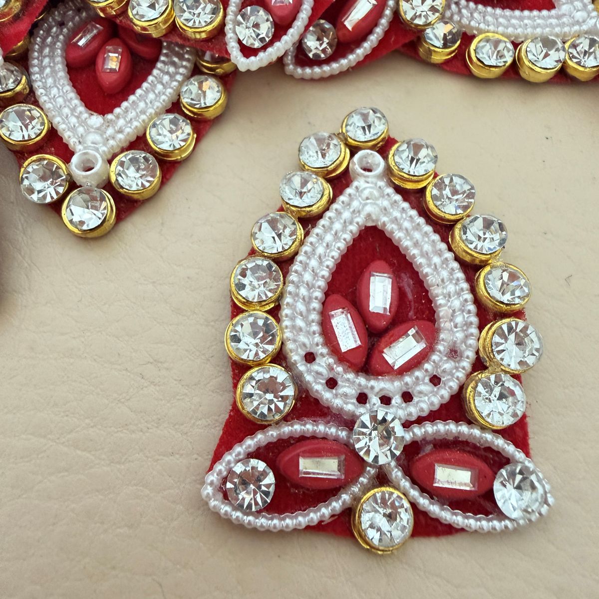 Reverse side of patch showing red net fabric