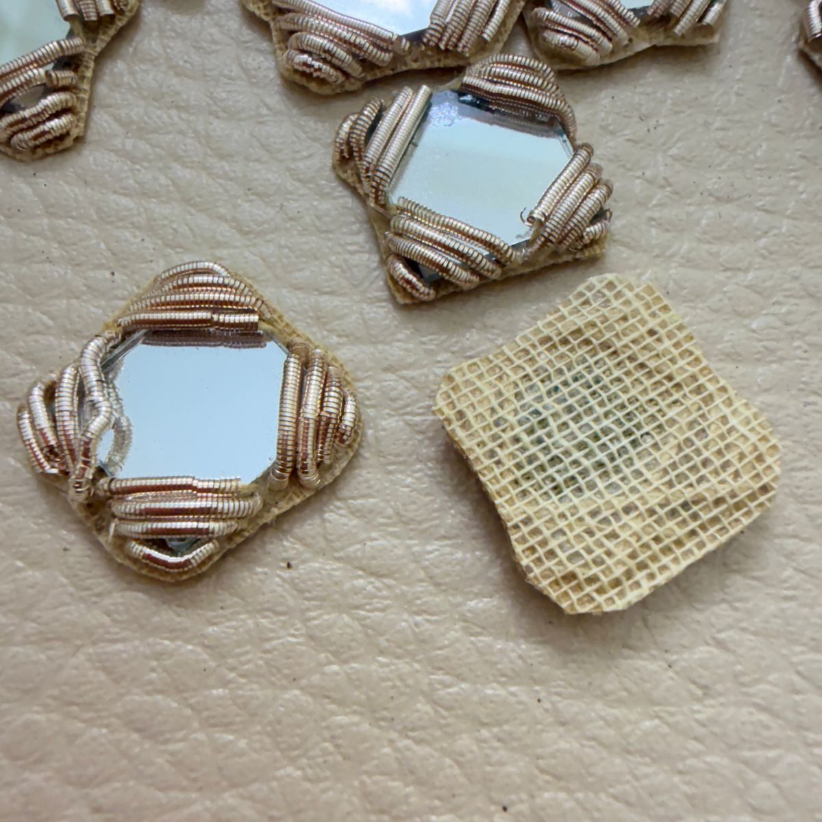 Antique gold square mirror applique patches – bulk view
