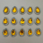 Amber gold teardrop rhinestone patches arranged in rows