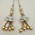 Group of ornate gold and silver pearl latkan tassels with dangling beads