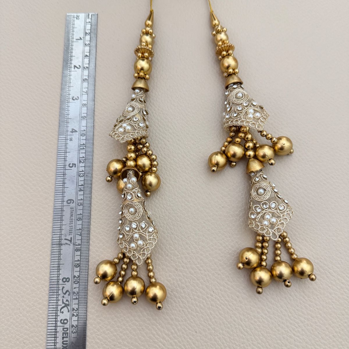 Pair of gold and silver latkans with faux pearls and bead drops