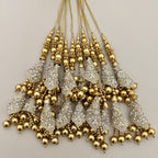 Group of gold and silver embroidered tassel latkans with pearl accents