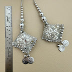 Matching pair of silver floral latkan tassels with metallic beads and dangling coin charms