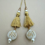 Group of gold thread latkan tassels with white seed-bead balls, pearl-look beads and champagne crystals