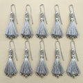 Single silver silk tassel with hanging cord loop